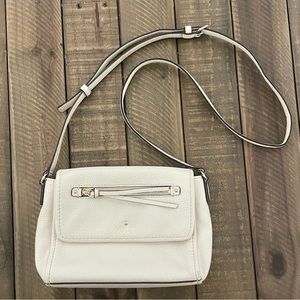 Cream Kate Spade purse with adjustable strap